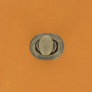 Fermoir tourniquet pour sac - ovale, laiton vieilli