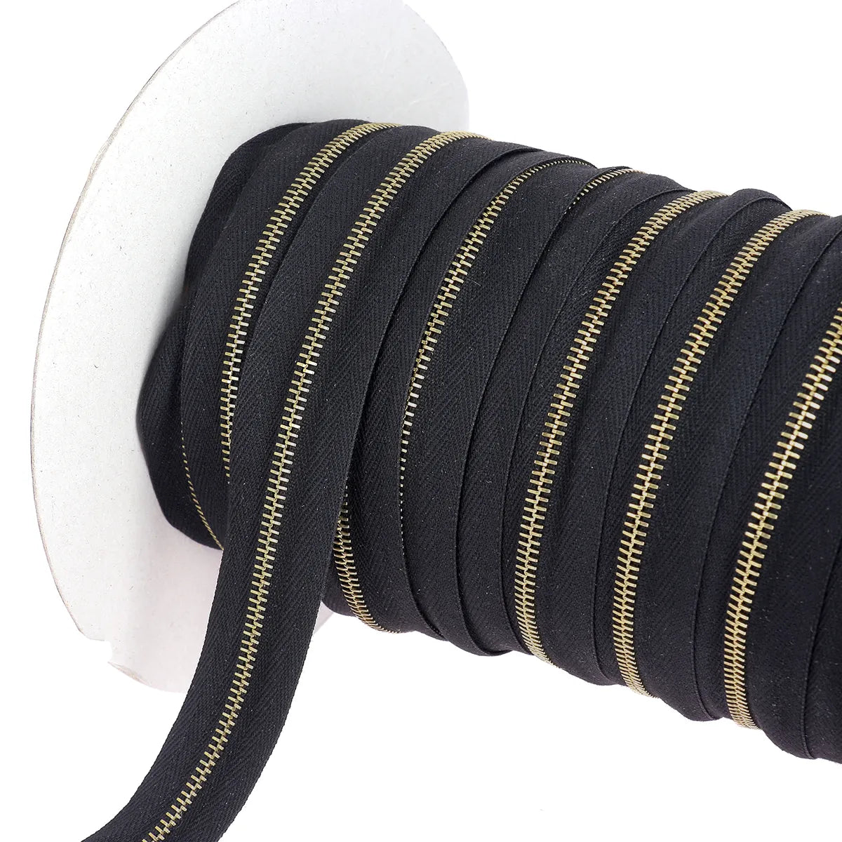 Fermeture éclair au mètre, fermeture zippée noire finition laiton largeur 6 mm