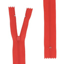 Fermeture à glissière en nylon rouge de 4 mm de largeur de maille. Disponible dans plusieurs longueurs au choix