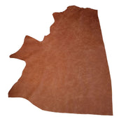 Peau de cuir de vachette pour ameublement CLUB en coloris cognac, texture lisse et naturelle, idéale pour décoration intérieure.