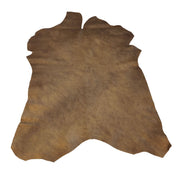 Peau de cuir de chèvre effet tamponné en bronze marbré, texture lisse avec motifs marbrés, fabriquée par Autres.