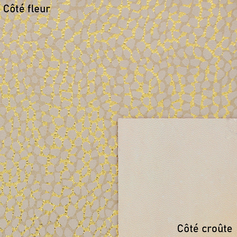 Peau de cuir velours motifs galets sur fond or