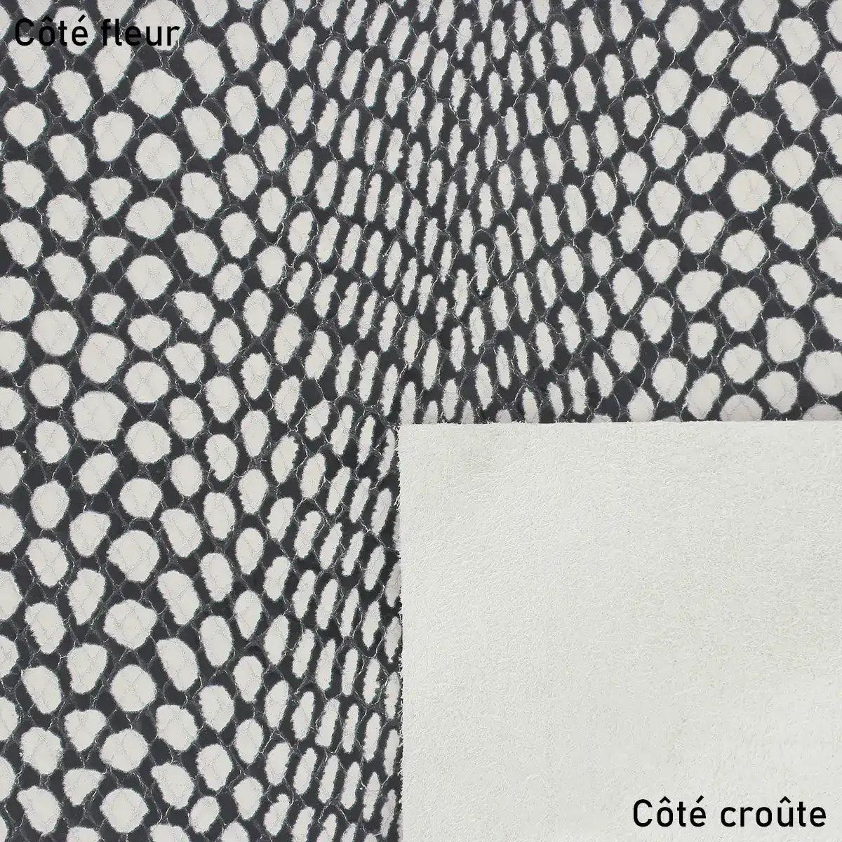 Cuir de veau noir et blanc imitation peau de serpent. Cuir effet peau de cobra idéal pour la réalisation de sac à main, pochette, porte-cartes, accessoire…