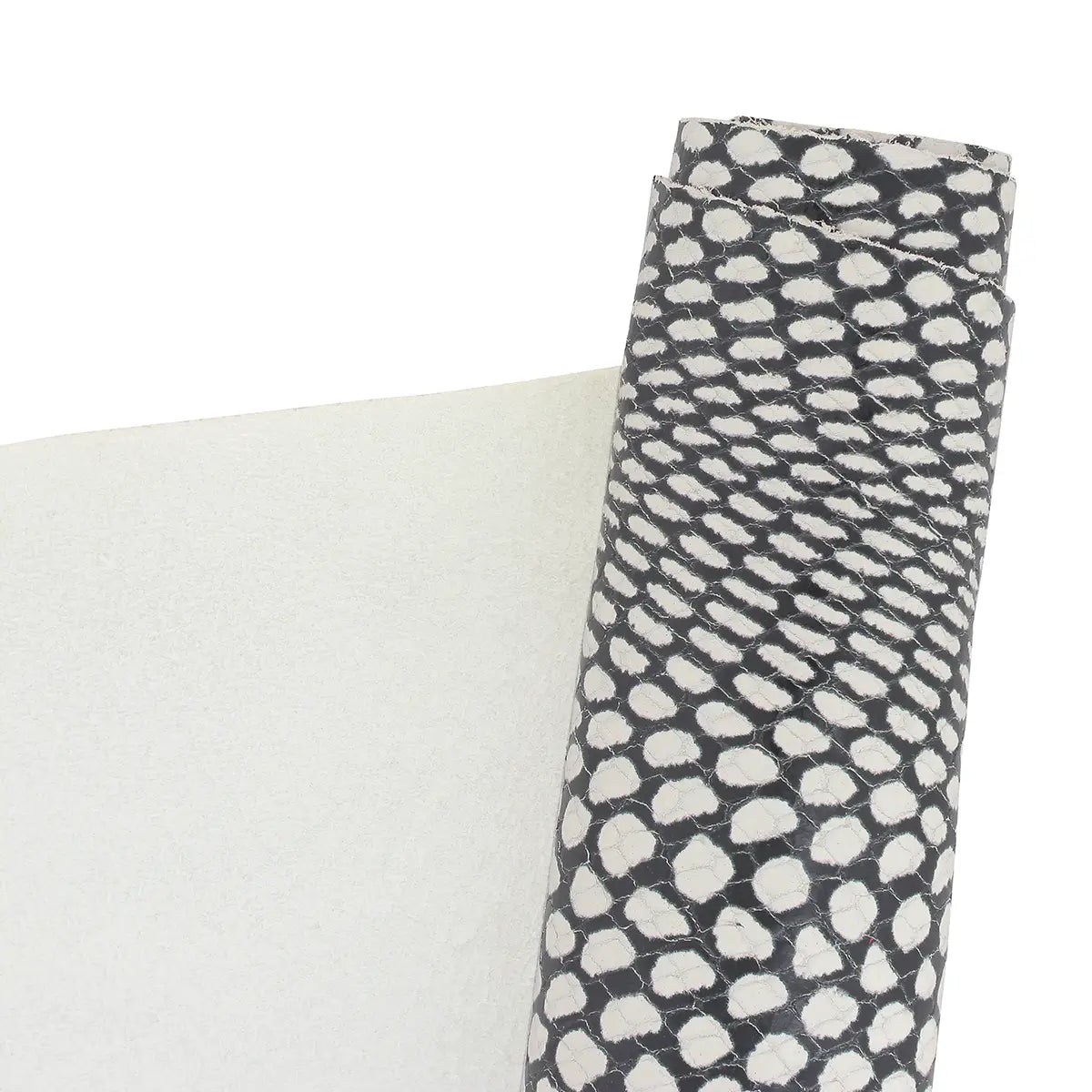 Peau de cuir effet peau de serpent noir et blanc. Cuir fantaisie idéal pour la réalisation de maroquinerie, accessoire...