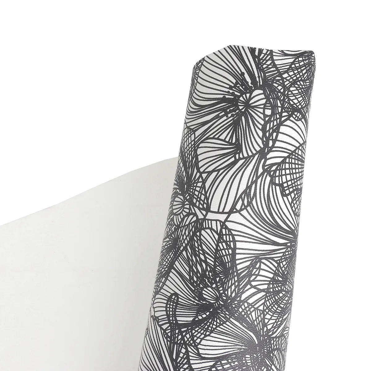 Peau de cuir d'agneau fantaisie avec imprimé floral noir et blanc. Cuir souple et fin idéal pour réaliser de la maroquinerie, de la décoration ou des accessoires tendances.