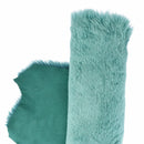 Cuir de mouton lainé à poils lisses couleur bleu canard. Cuir souple idéal pour la fabrication de vêtement, chaussons, bottes, bourses...