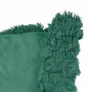 Cuir de mouton lainé à poils longs et frisés couleur vert canard. Cuir original pour des créations à la fois douces et uniques.