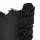 Cuir de mouton lainé noir à poils longs et ondulés. Cuir original idéal pour réaliser : vêtements, bottes, chaussons, accessoires...