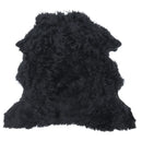 Peau entière en cuir de mouton lainé noir. Cuir doux et souple idéal pour la fabrication de vêtement, botte, chausson, accessoire...