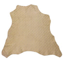 Peau entière en cuir de chèvre velours couleur sable et son motif à rayures noires.