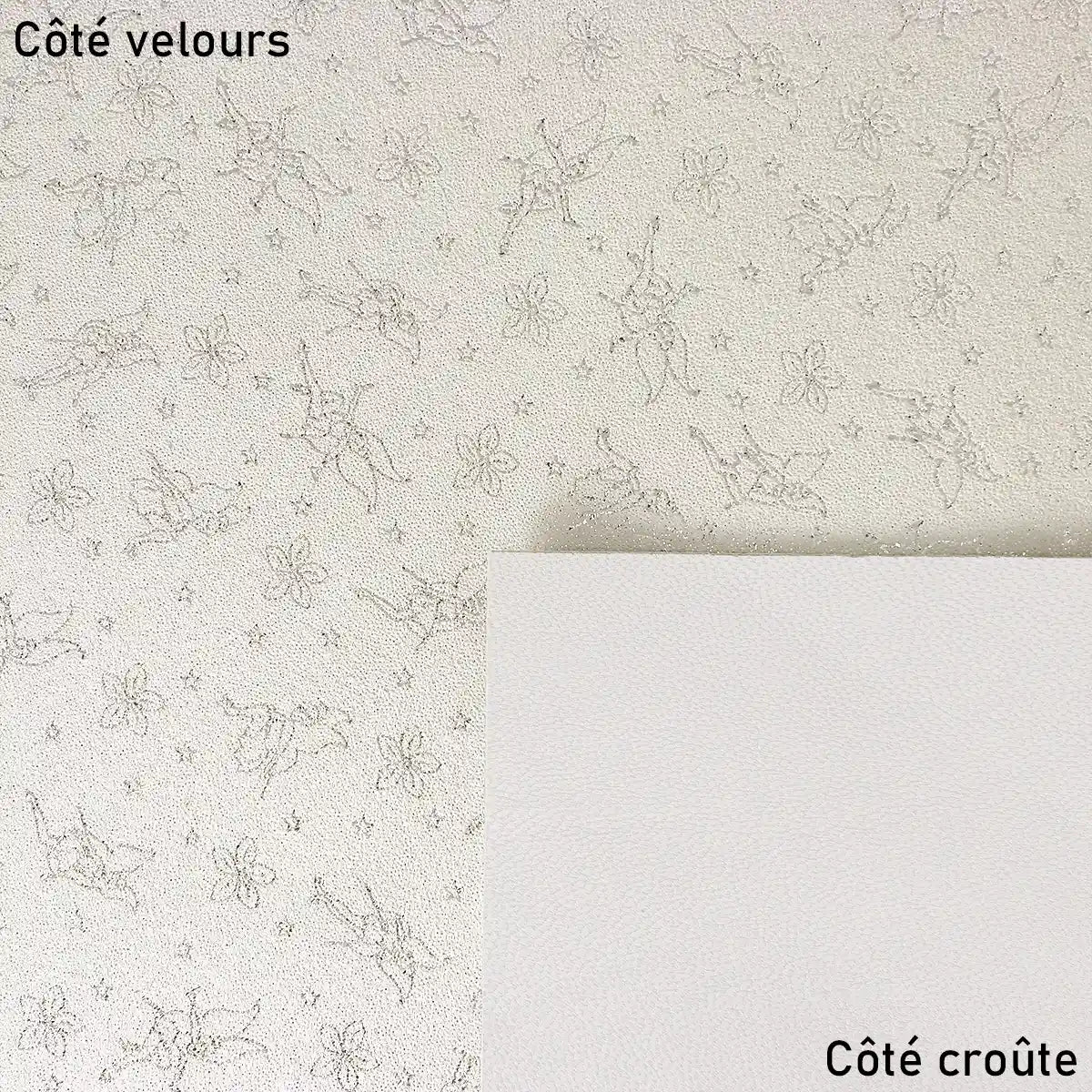 Cuir velours blanc motif féerique. 