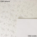 Cuir velours blanc motif féerique. 