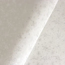 Zoom sur les détails de ce cuir de chèvre velours blanc au motif féerique avec de jolies fées argentées.