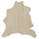 Peau entière en cuir de chèvre velours beige taupe avec motif pointillés dorés.