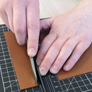 Règle sécurisée pour la découpe du cuir