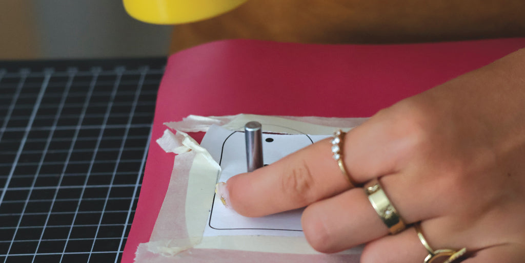 Making the holes on the paper pattern for the October Rose key case