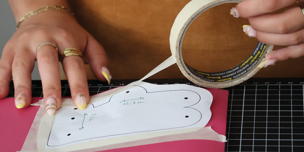 Positioning the pattern on our leather to create our October Rose boobs key case