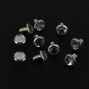 Lot de 10 rivets strass en cristal pour accessoires, de marque Deco Cuir, visibles avec détails brillants et décoratifs.