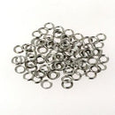 100 rondelles oeillet diam 4mm nickele.jpg