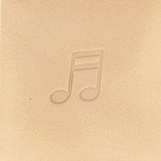 Outil Matoir sur manche Tandy Leather avec note de musique gravée, utilisé pour le travail du cuir.