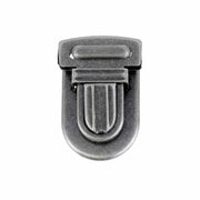 Fermeture de cartable TUCK Autres, 23x30mm, accessoire pour sac ou bagage, en métal, avec mécanisme de fixation.