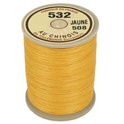 Bobine de 250m de fil de lin câblé glacé Jaune 508 de la marque Fil au Chinois, vue de côté sur la bobine.